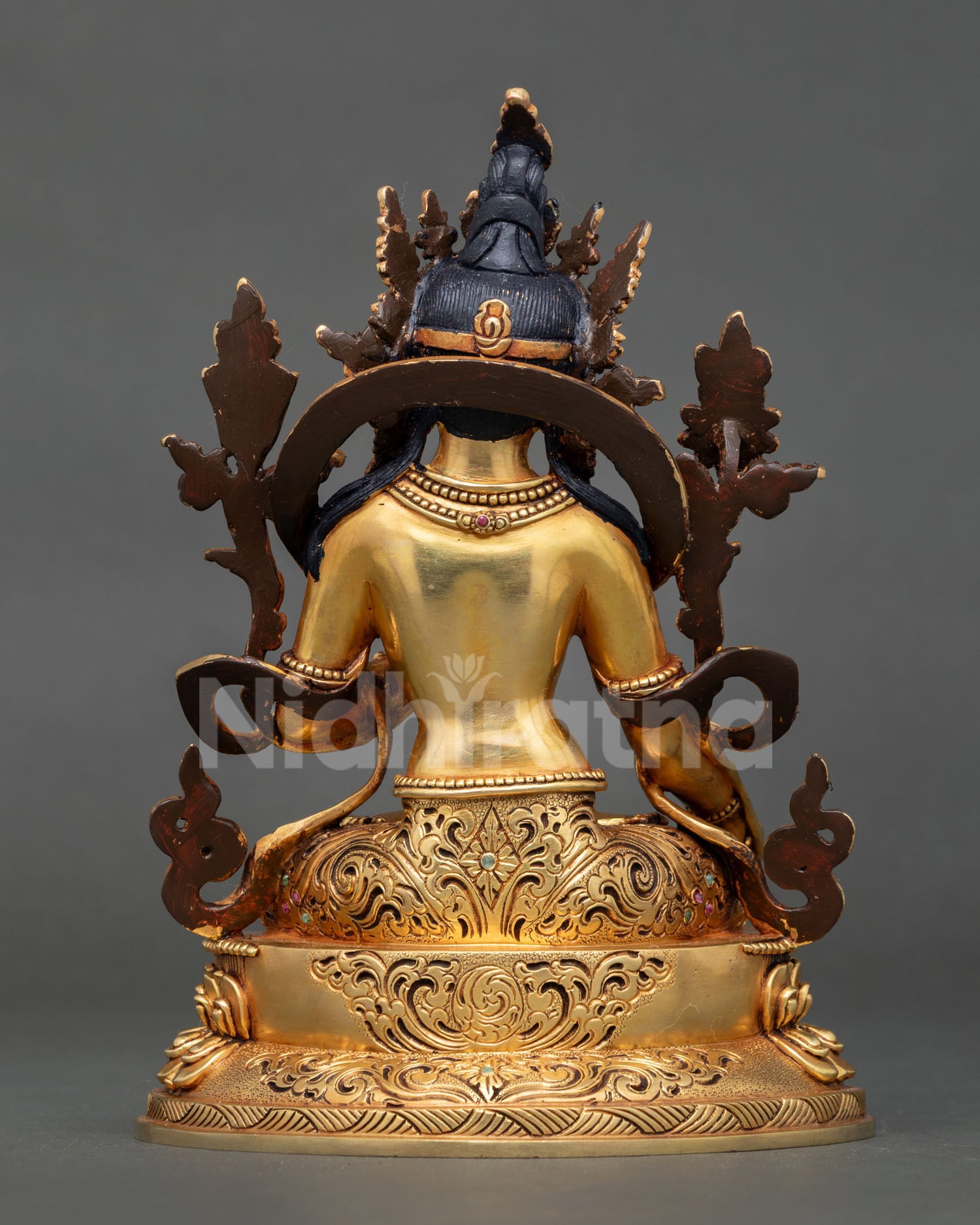 White Tara back view lotus base sacred chamber copper gold Nepal sculpture