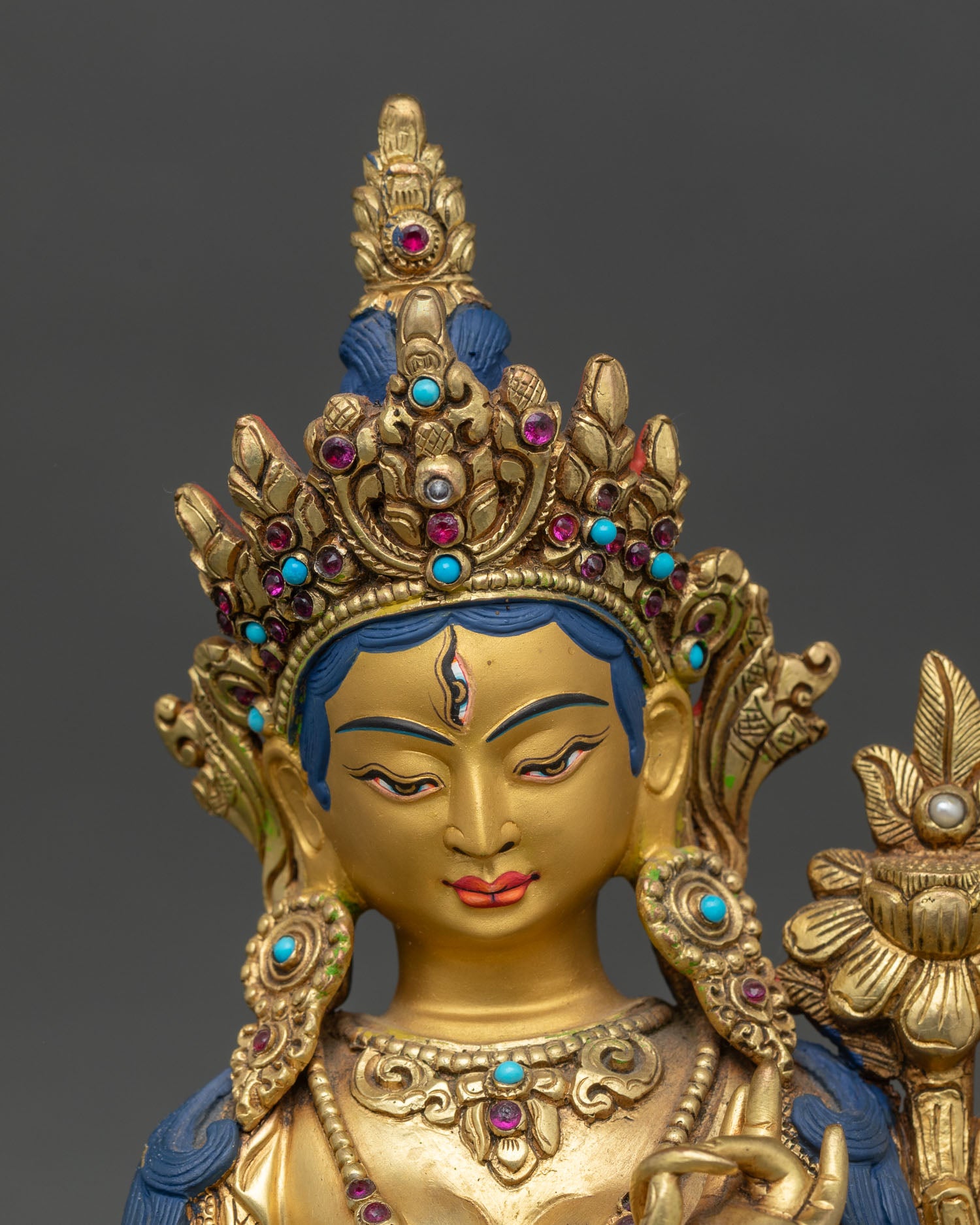 White Tara close-up showing intricate gold detailing and handcrafted Nepalese artistry