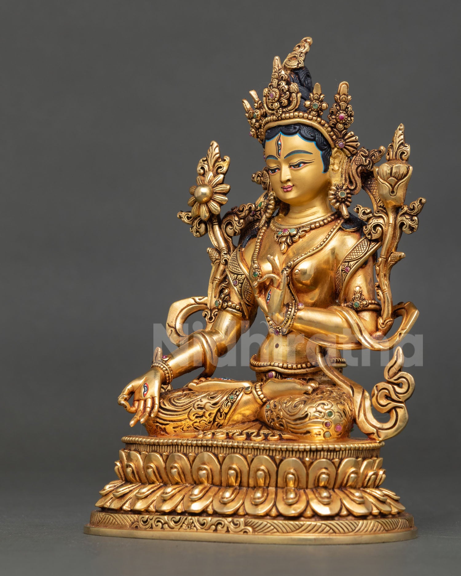 White Tara left profile view ornate jewelry Himalayan Buddhist handcrafted statue