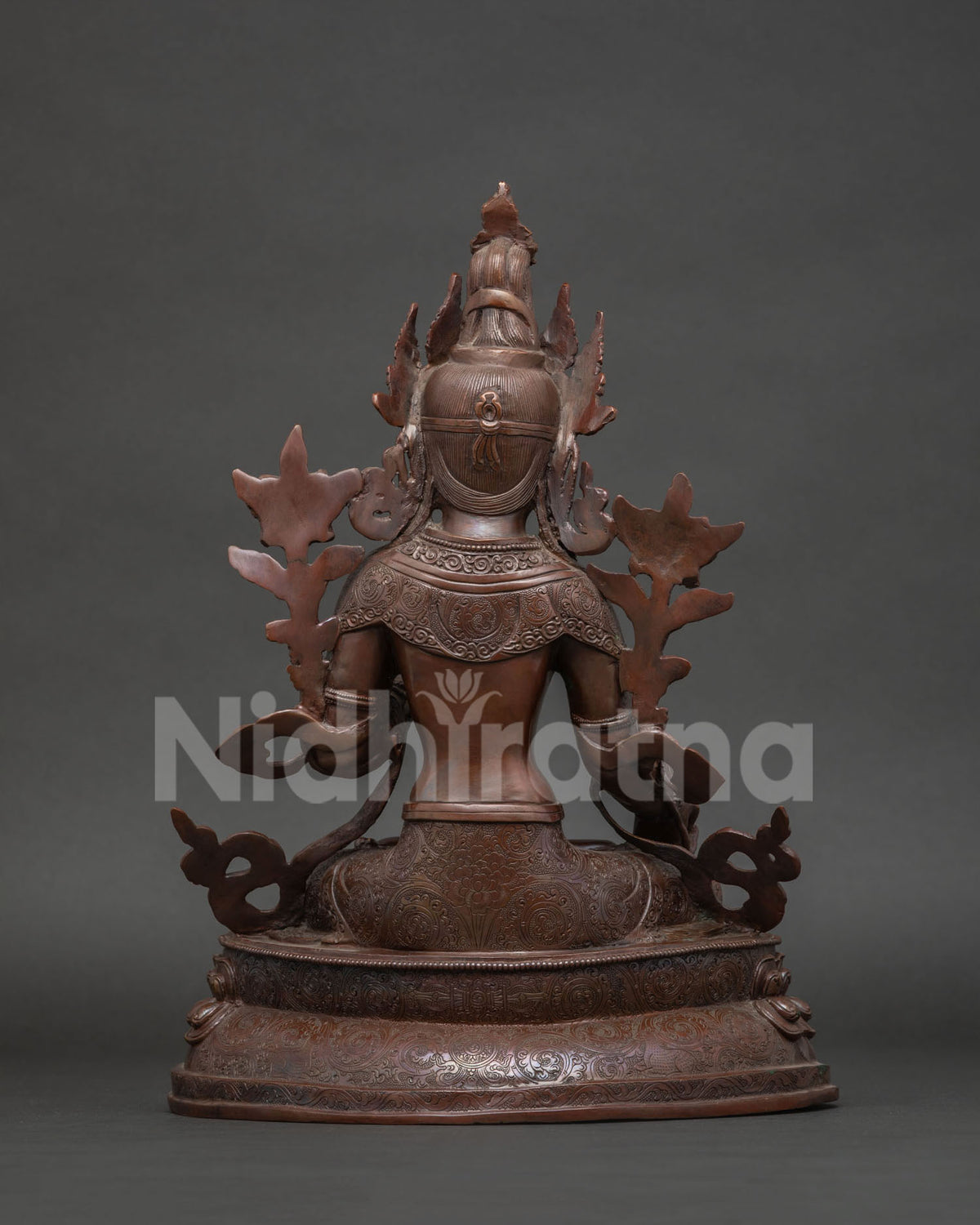 white tara statue back view oxidized copper patina lotus pedestal nepal