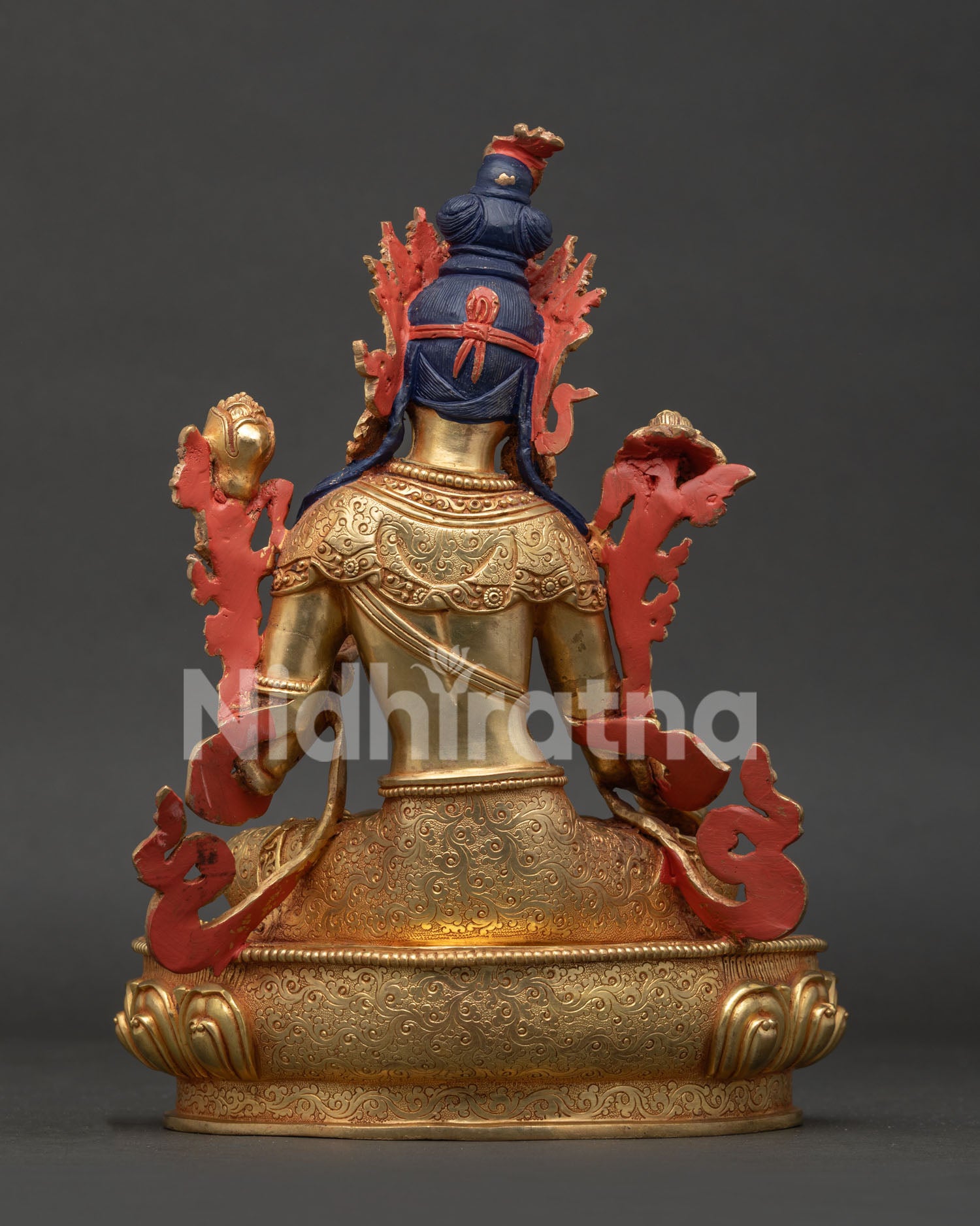 White Tara statue back view showing hand carved silk garment and Newari craftsmanship
