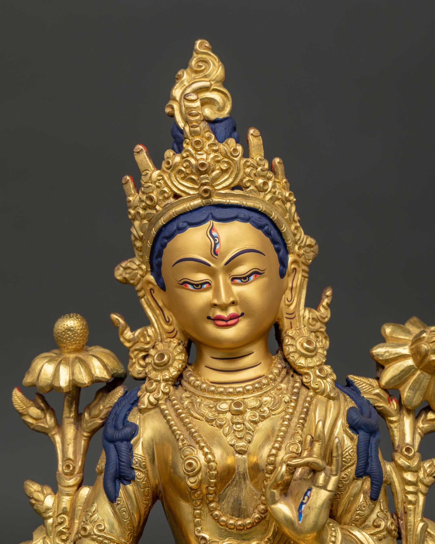 White Tara Statue Gold-Painted Face with Seven Eyes Close-Up by Newari Artisans.
