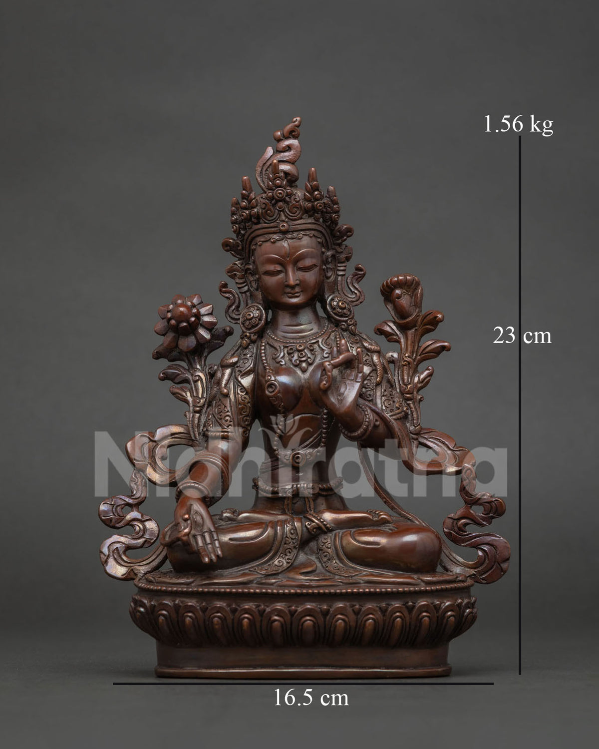 White tara statue handcrafted by newari artists from patan nepal in chemically oxidized copper.