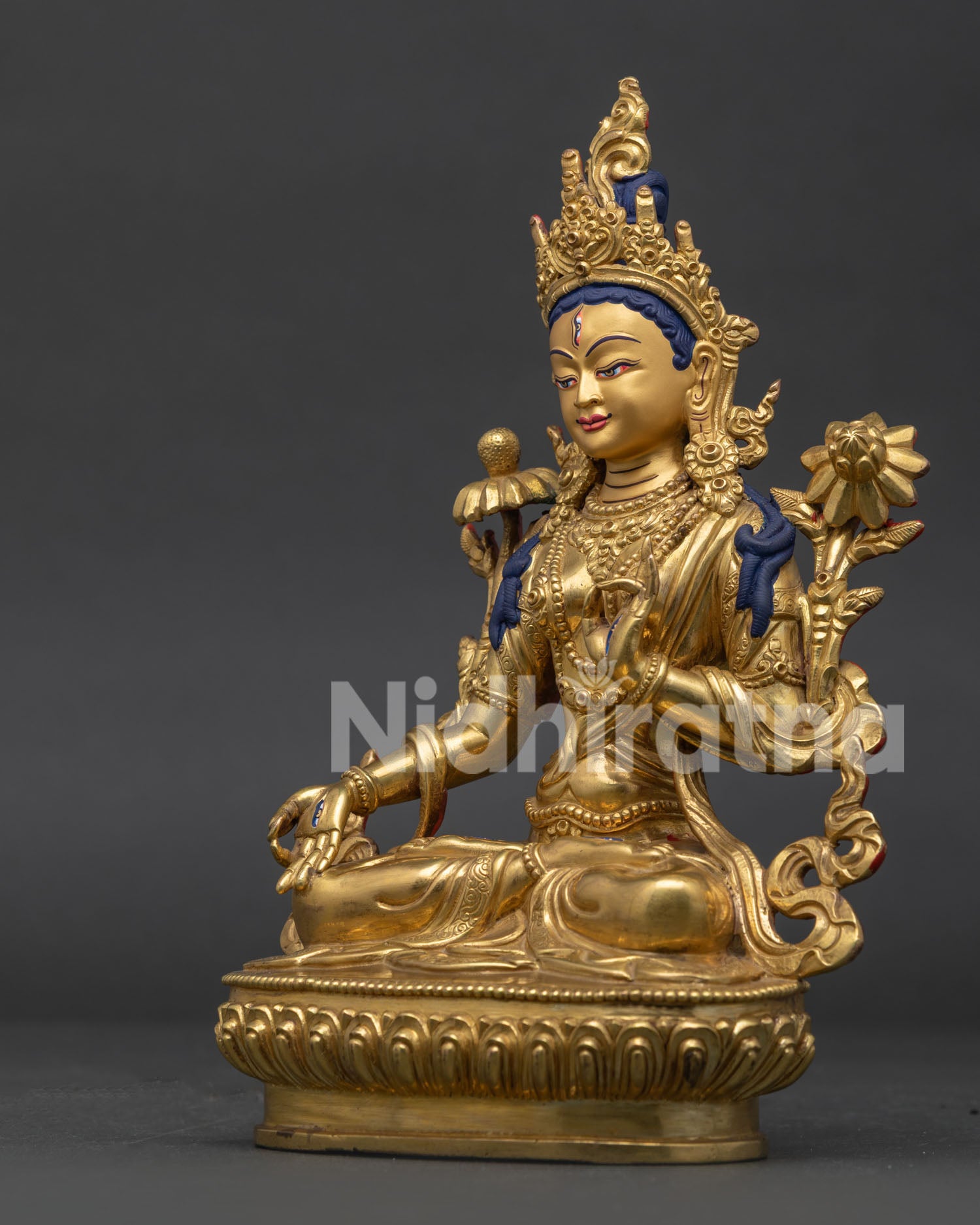 White Tara Statue Holding Utpala Flower and Varada Mudra Detailed Side View.