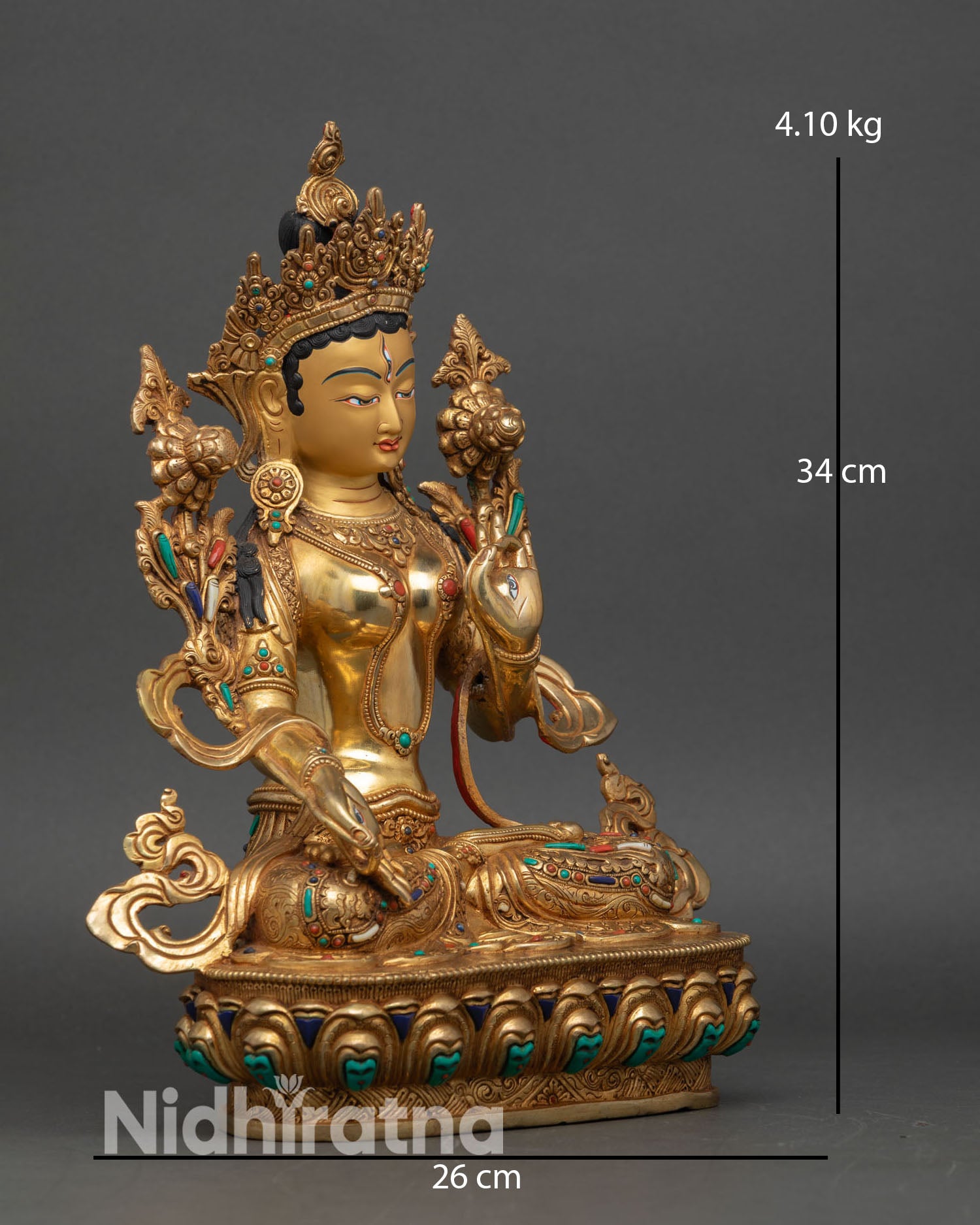 white tara statue right side view, handcrafted nepalese buddhist artwork in copper and gold