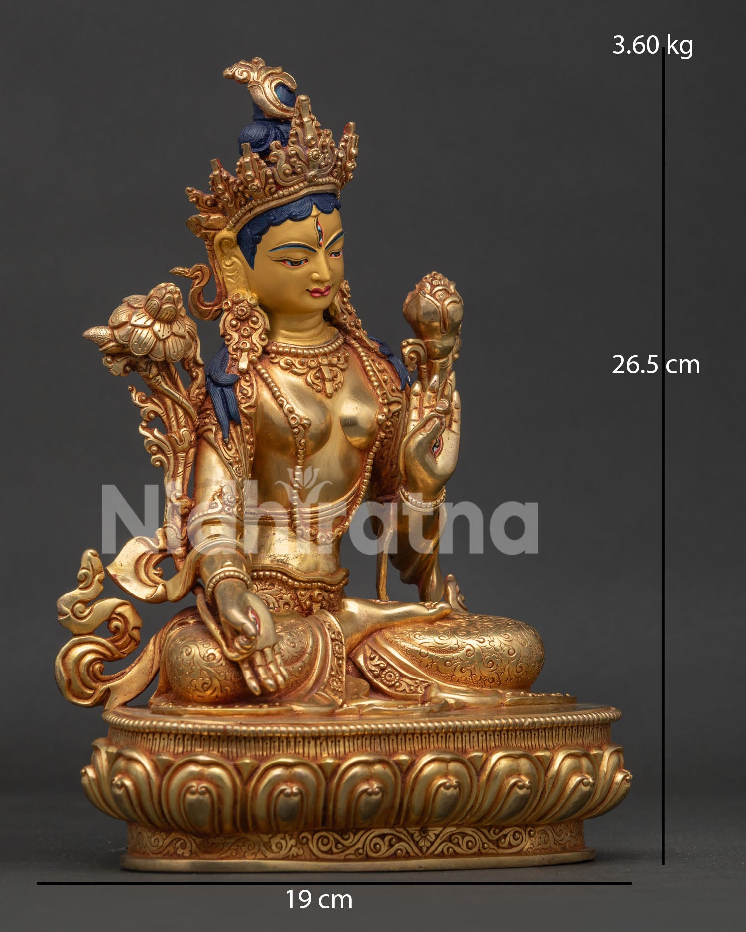 White Tara statue side view with elegant lotus seat and handcrafted Himalayan artistry.