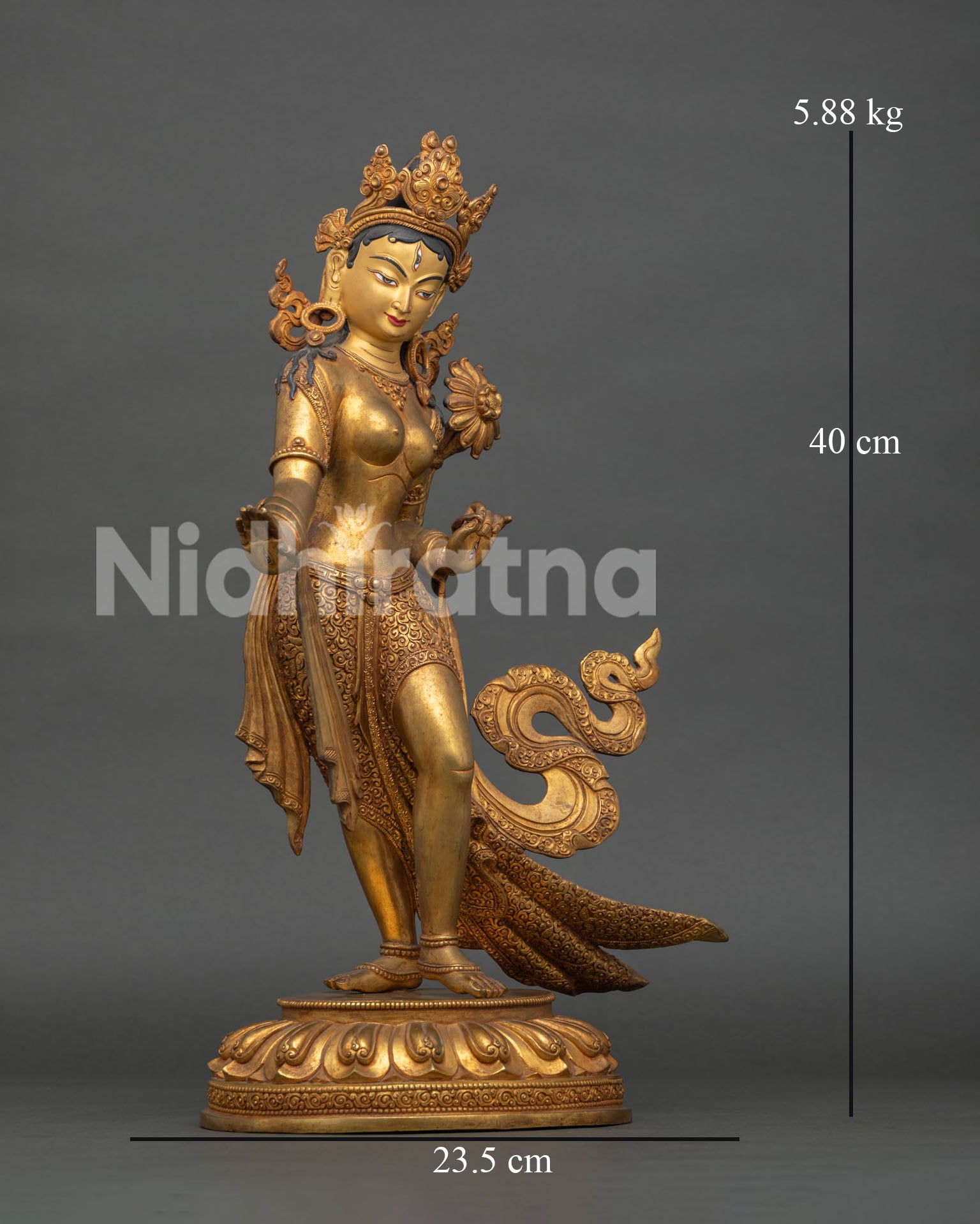 White Tara statue standing on lotus pedestal with seven eyes symbolizing compassion and healing
