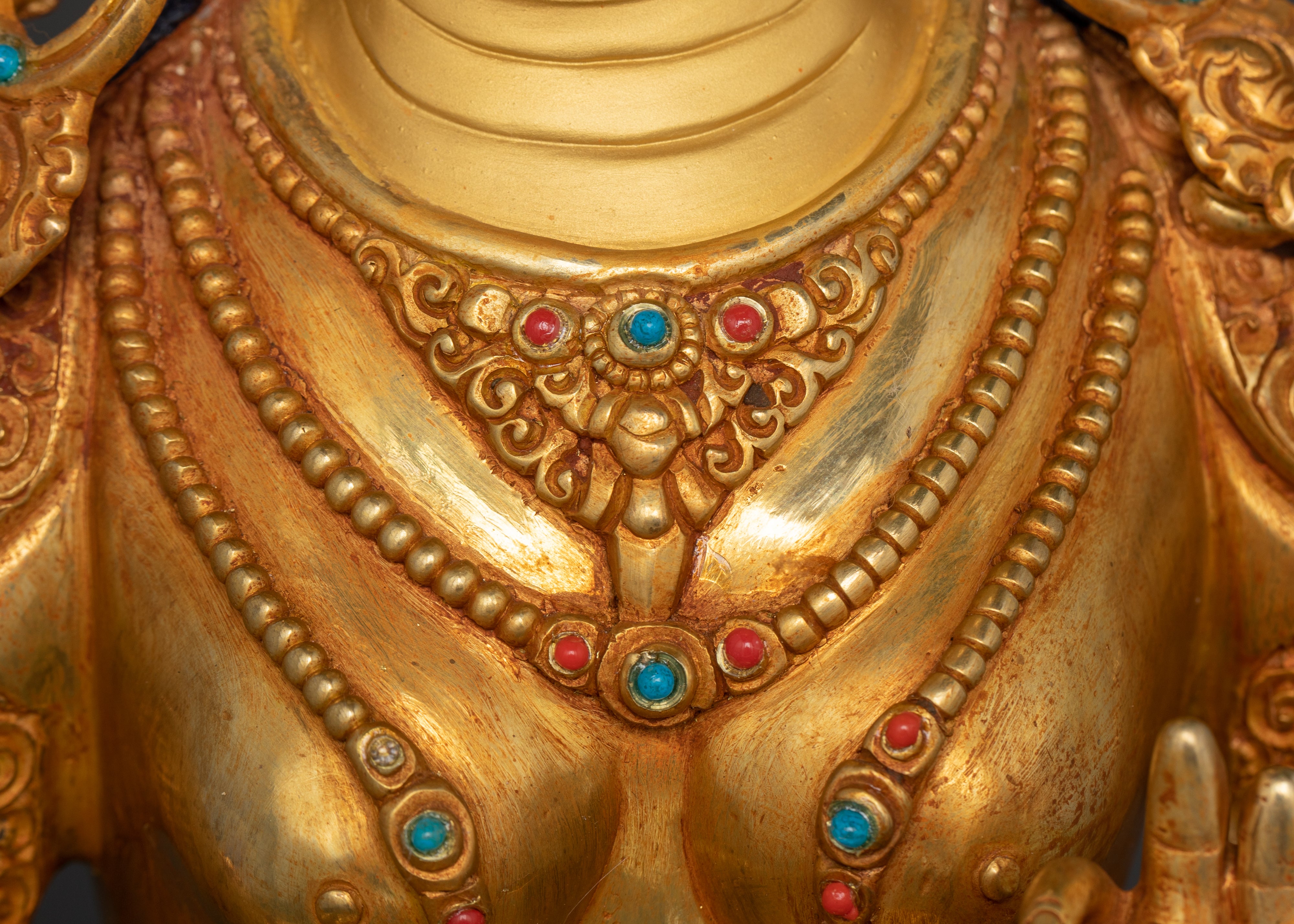 necklace of white tara adorned with red corals and turquoise
