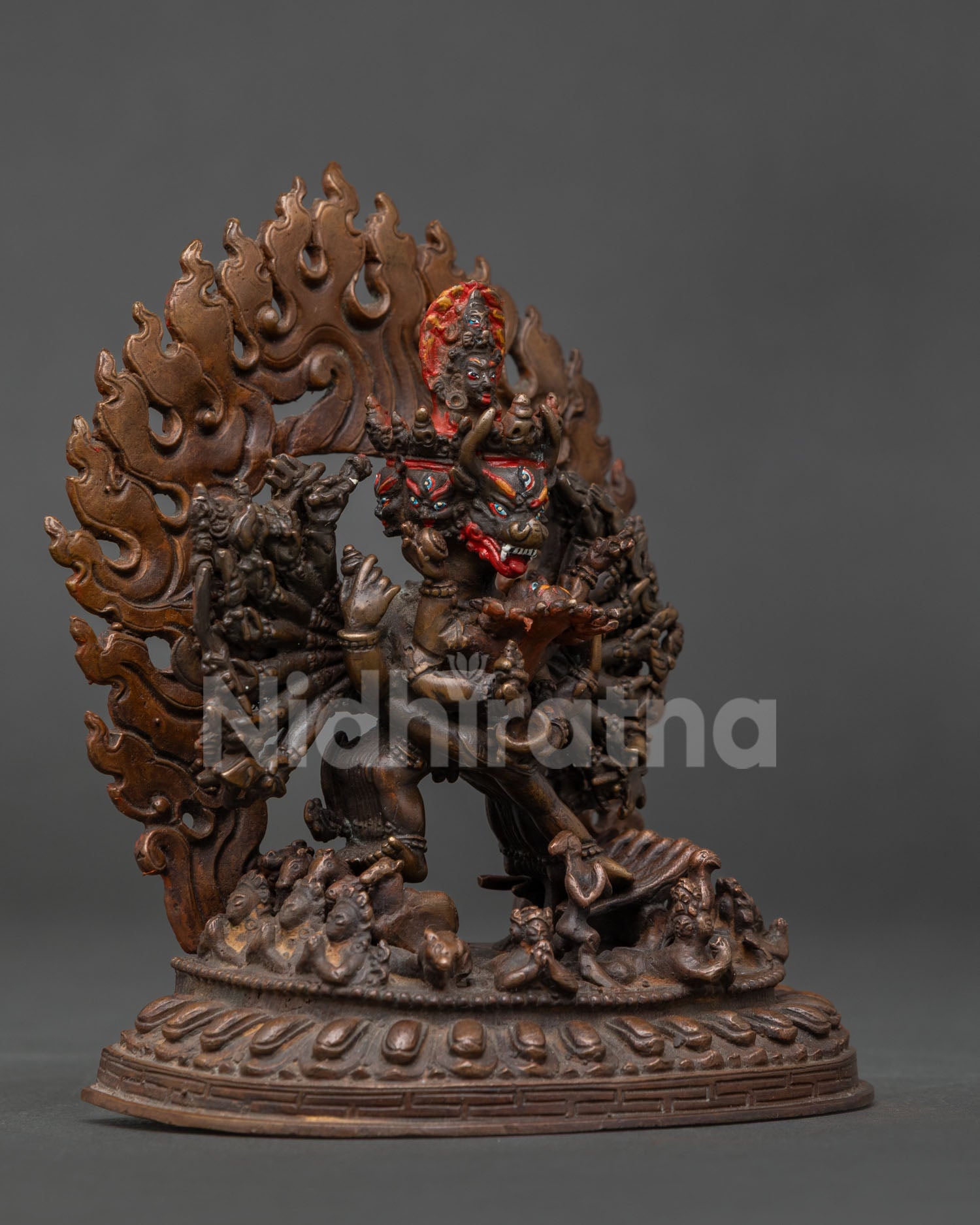 Yamantaka with Vajravetali standing on lotus pedestal with blazing halo.