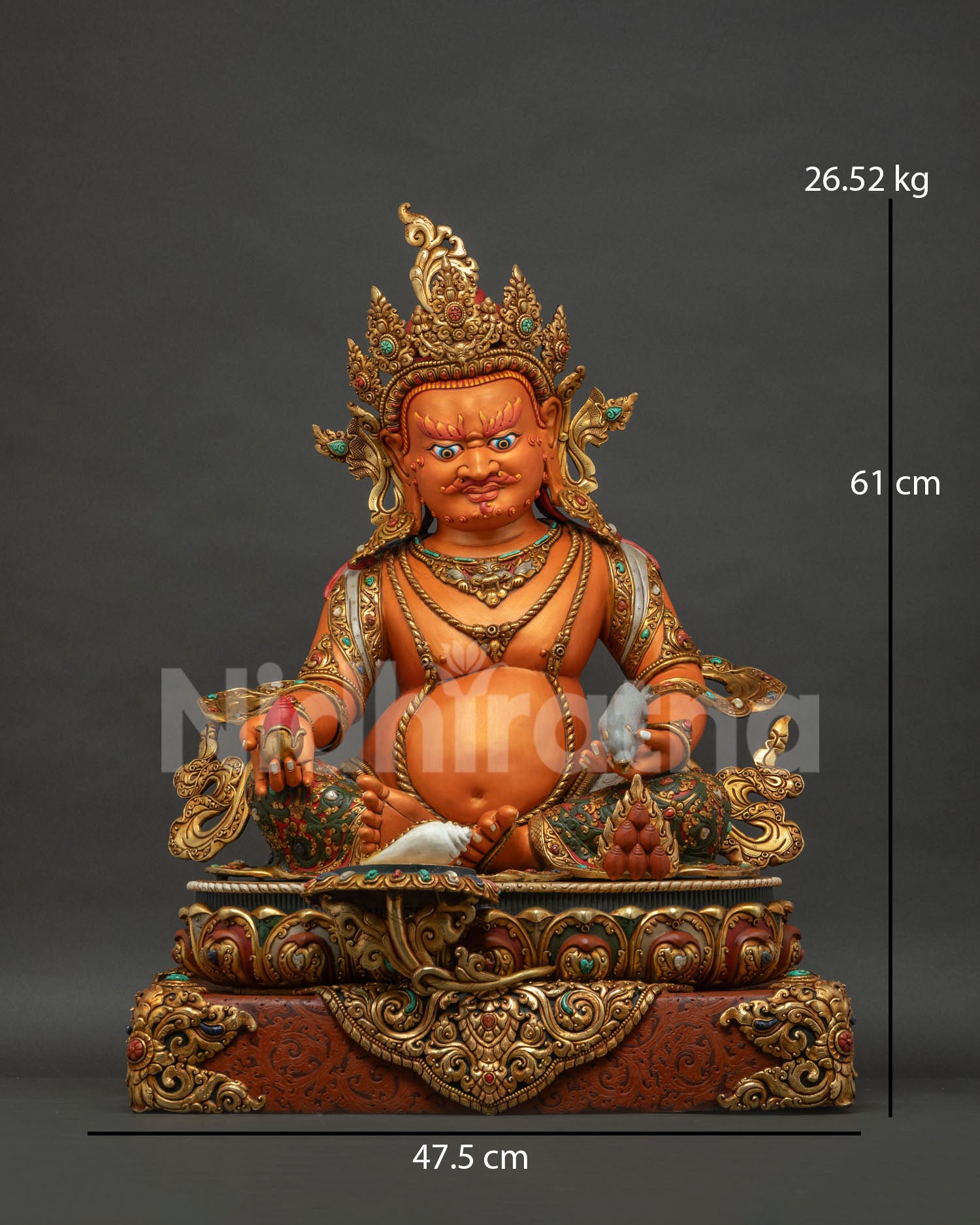 Yellow Dzambhala statue front view, handcrafted copper sculpture with gold gilding from Nepal