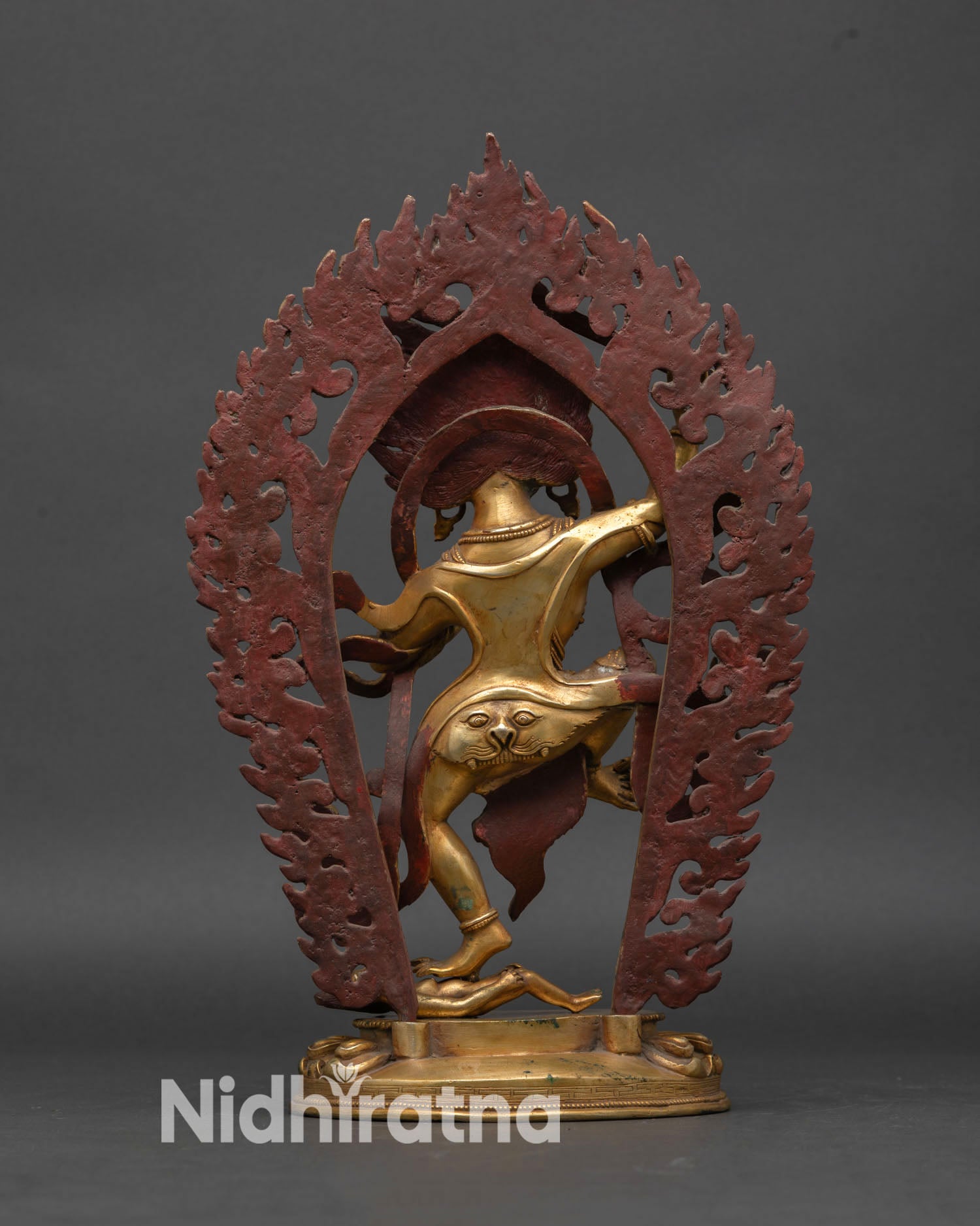 Yeshe Walmo statue back view intricate carving oxidized copper gold accents sacred Buddhist altar decor purification flames spiritual art