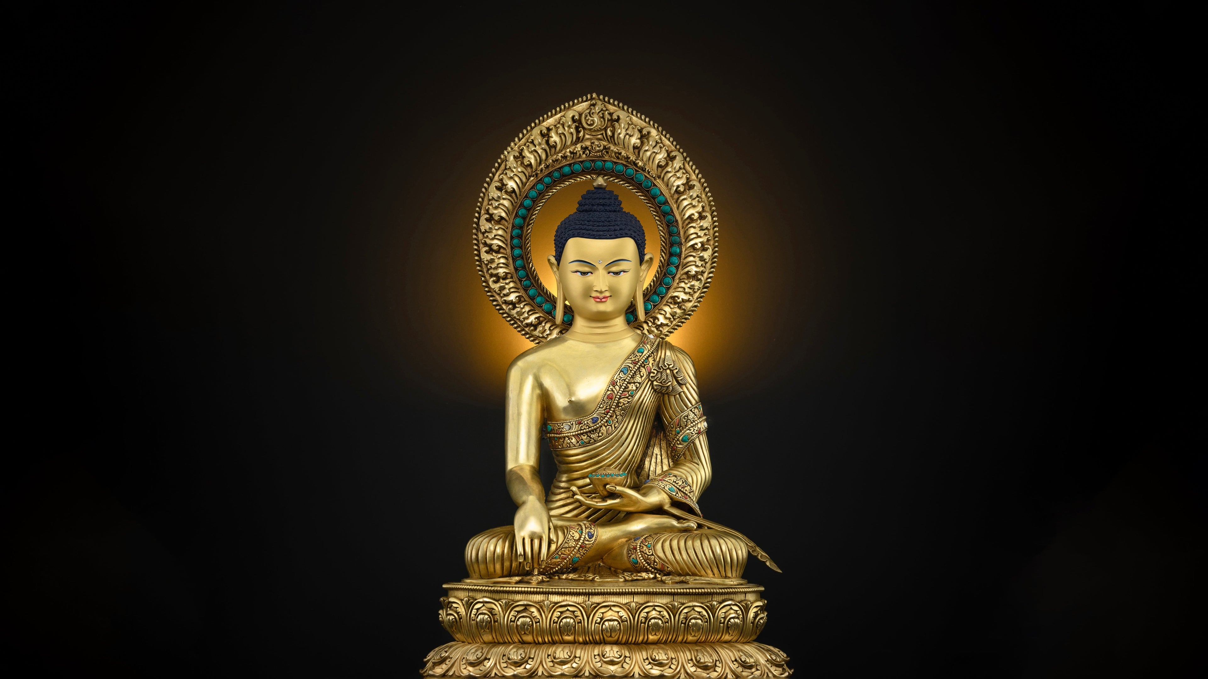 A big buddha statue with a big halo fit for religious altar decor