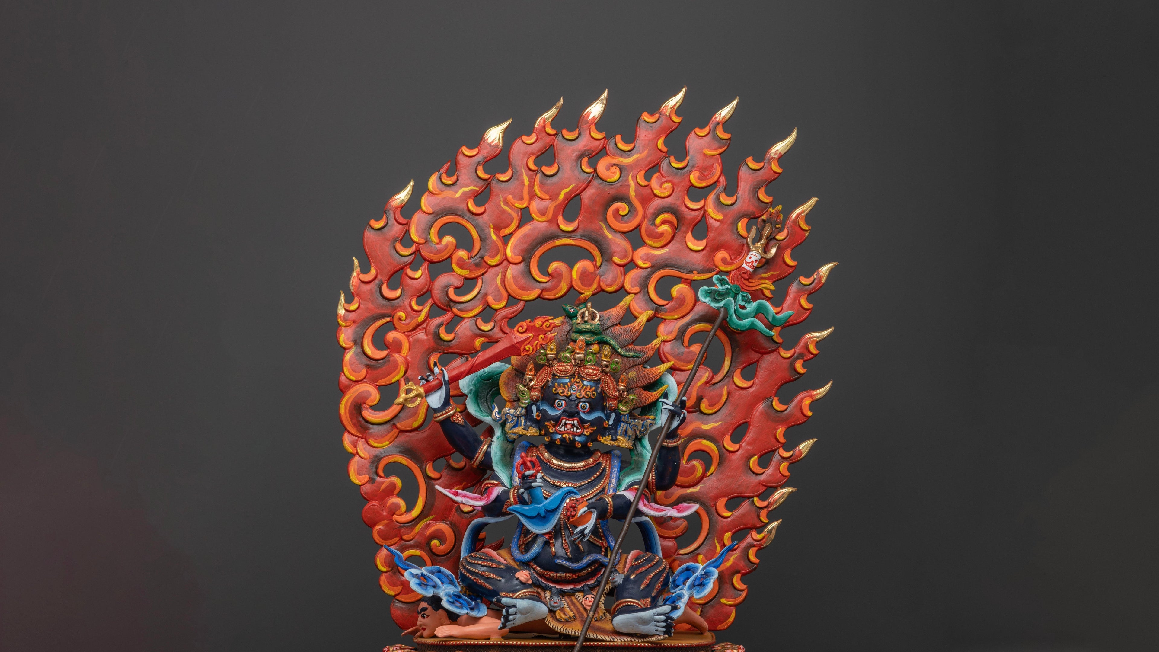 Colorfully Vibrant Statue of four armed mahakala with his wrathful look on sale