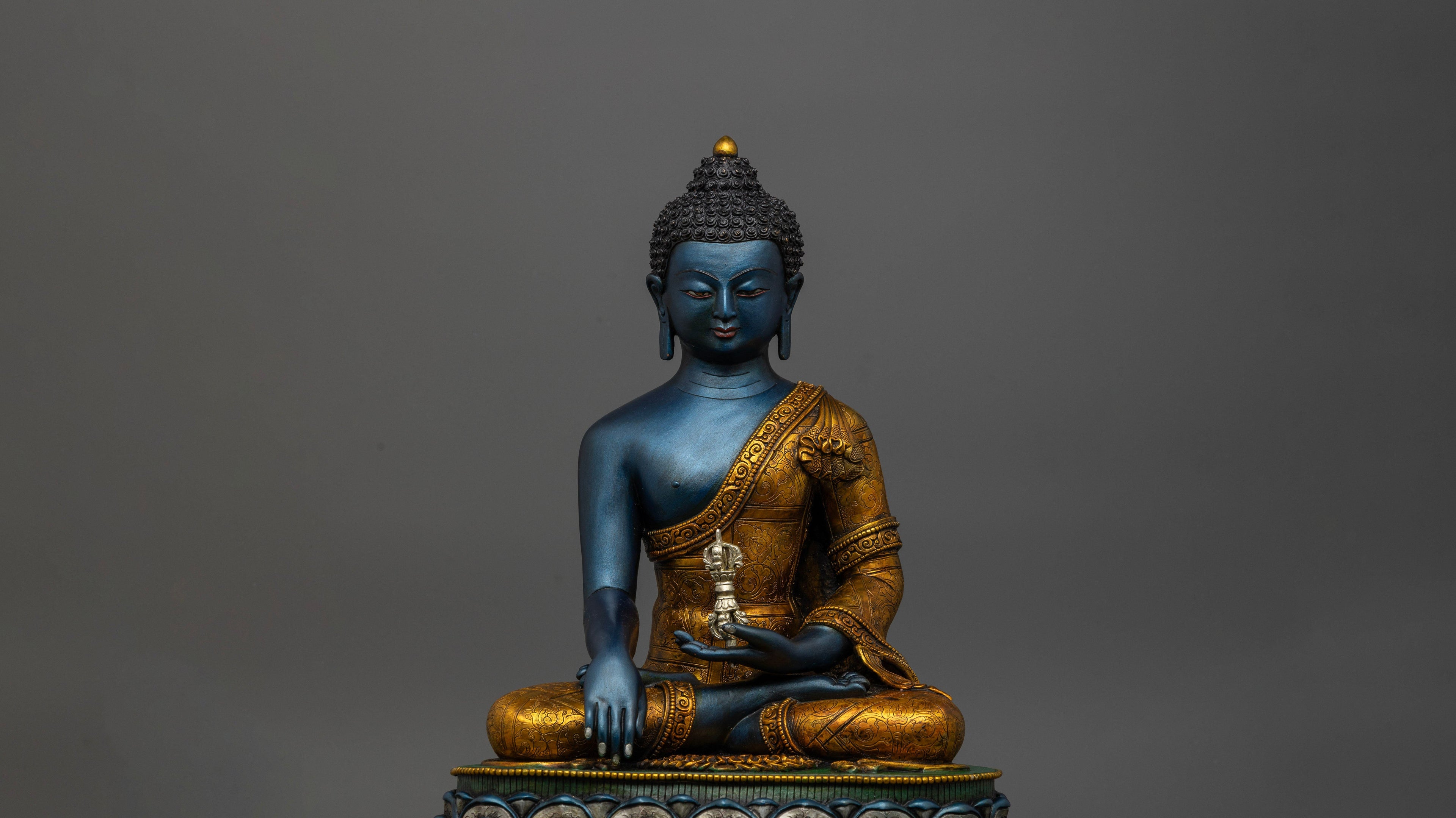 blue skinned with golden robes of Mitrugpa statue