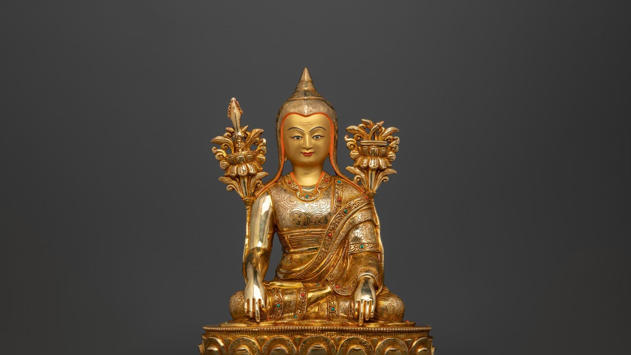 golden Longchenpa statue sitting peacefully on his lotus seat