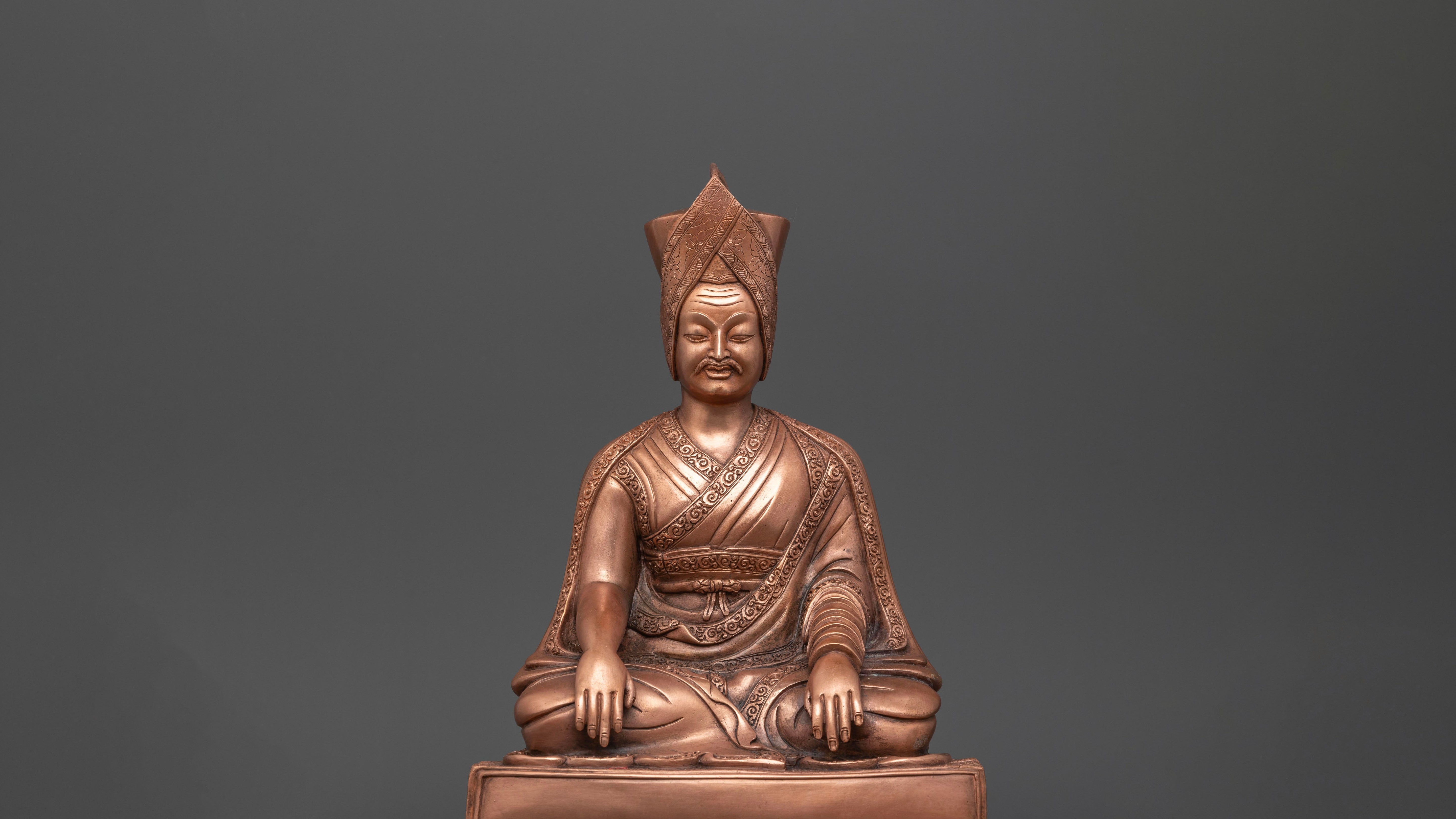 shiny light brown colored statue of Luding Khenchen 