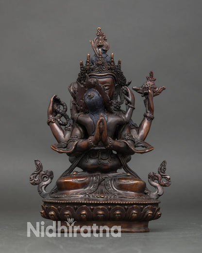 front view of chenrezig consort statue handcrafted copper oxidized finish four hands rosary blue lotus cintamani