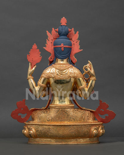 Back view Chenrezig statue showing gold gilded copper details and ornate jewelry.