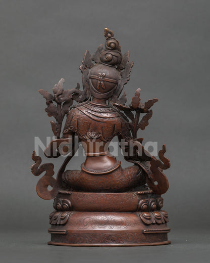 Handcrafted Green tara statue with vitarka mudra for buddhist altar and meditation space.