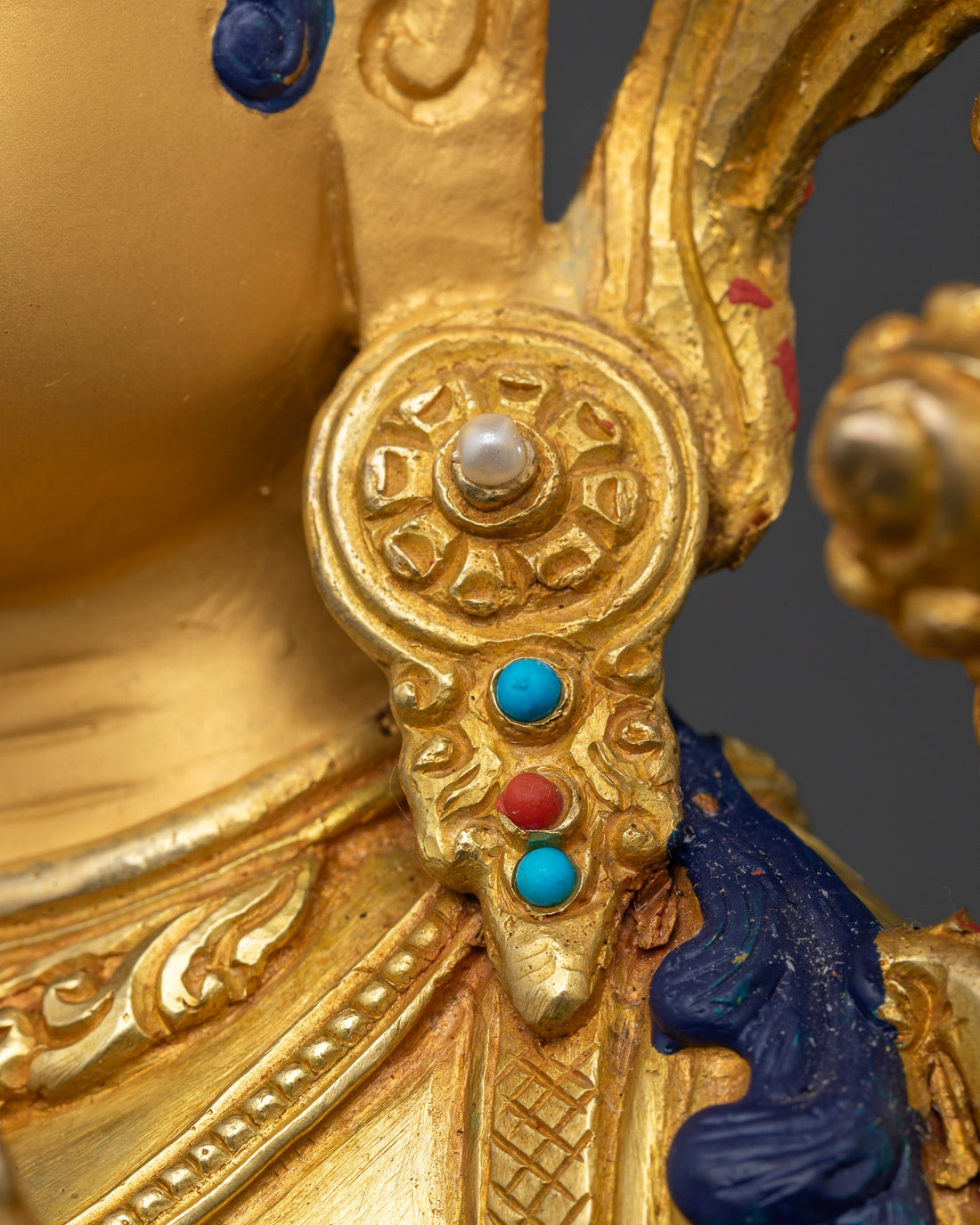 Radiant Resplendence: The Gold-Gilded Green Tara