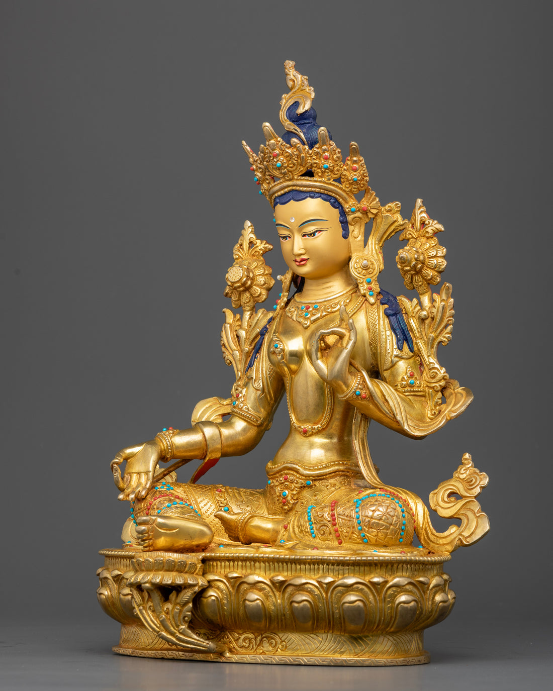 Radiant Resplendence: The Gold-Gilded Green Tara