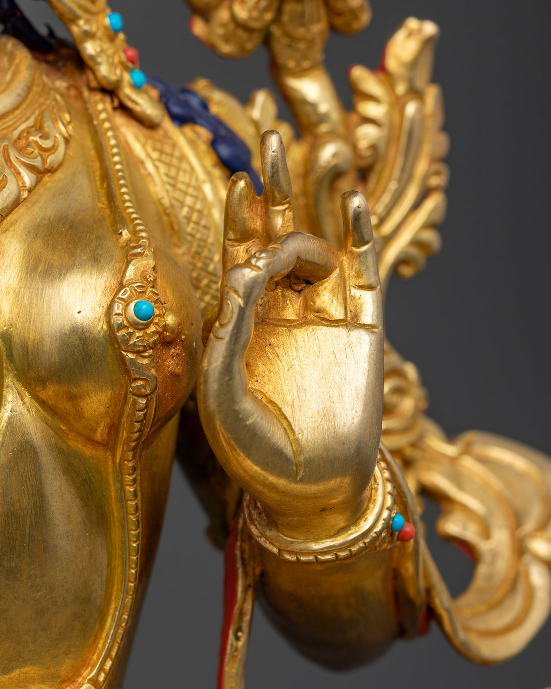 Radiant Resplendence: The Gold-Gilded Green Tara