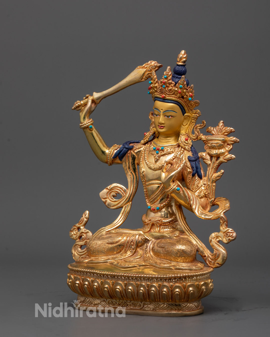 24K fire-gilded body with intricate design, side angle of Manjushri Bodhisattva sculpture