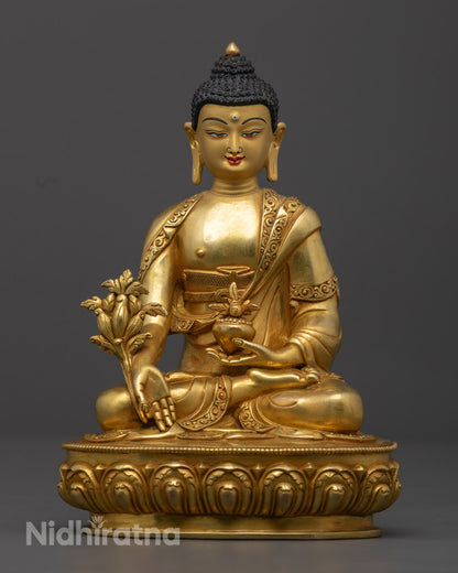 24K gold gilded Medicine Buddha statue seated on a lotus throne, handcrafted in copper with intricate Nepalese detailing for spiritual healing and meditation.
