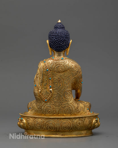 24K fire gilded Shakyamuni Buddha sculpture with turquoise inlay and floral robe motifs