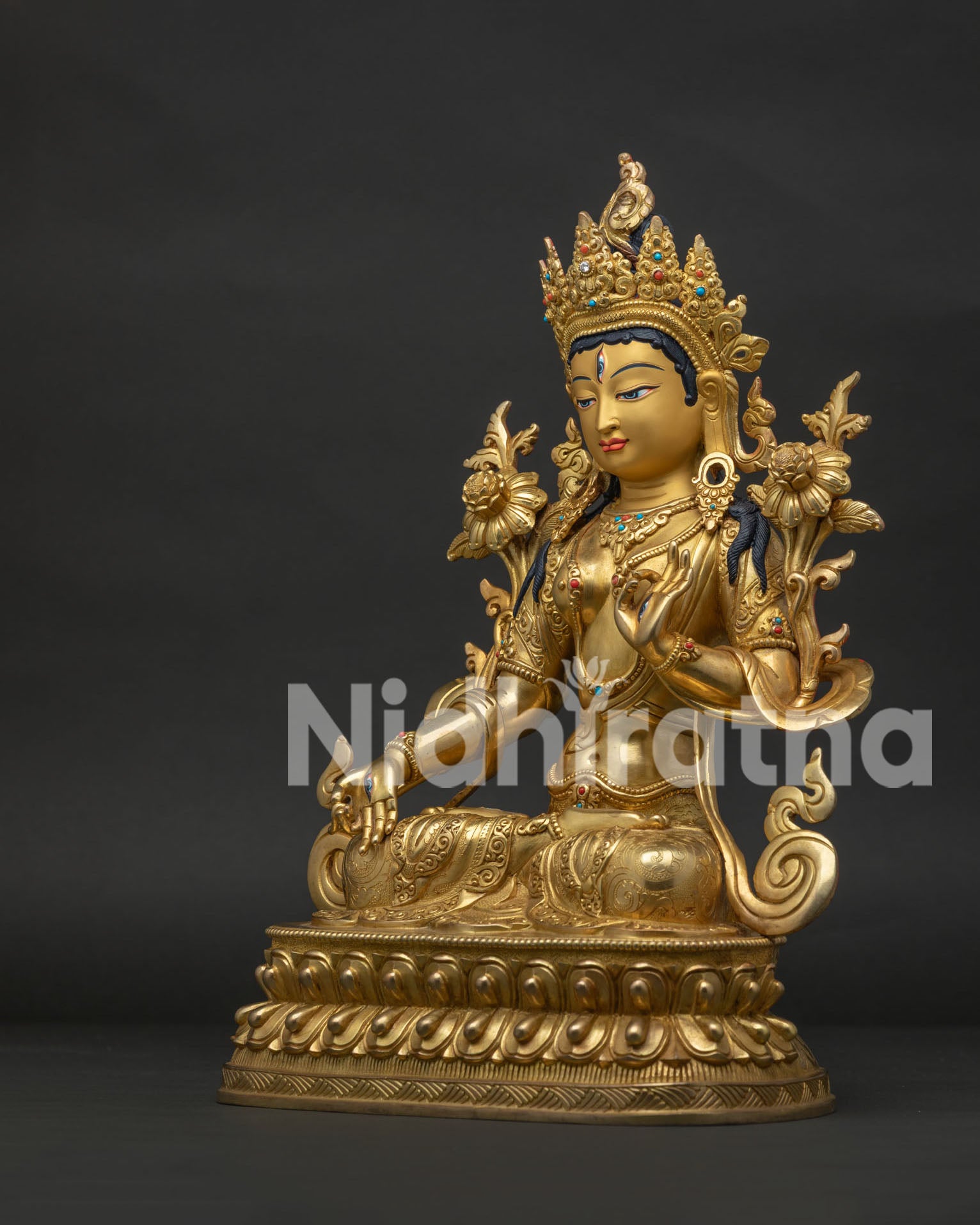 24K gold gilded White Tara Buddhist sculpture from the left side