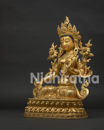 24K gold gilded White Tara Buddhist sculpture from the left side