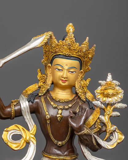 24k gold gilded Manjushri statue holding Prajnaparamita Sutra on lotus