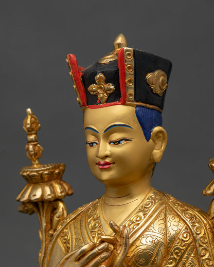 Side close-up of 3rd Karmapa statue highlighting lotus stems and vajra ornamentation
