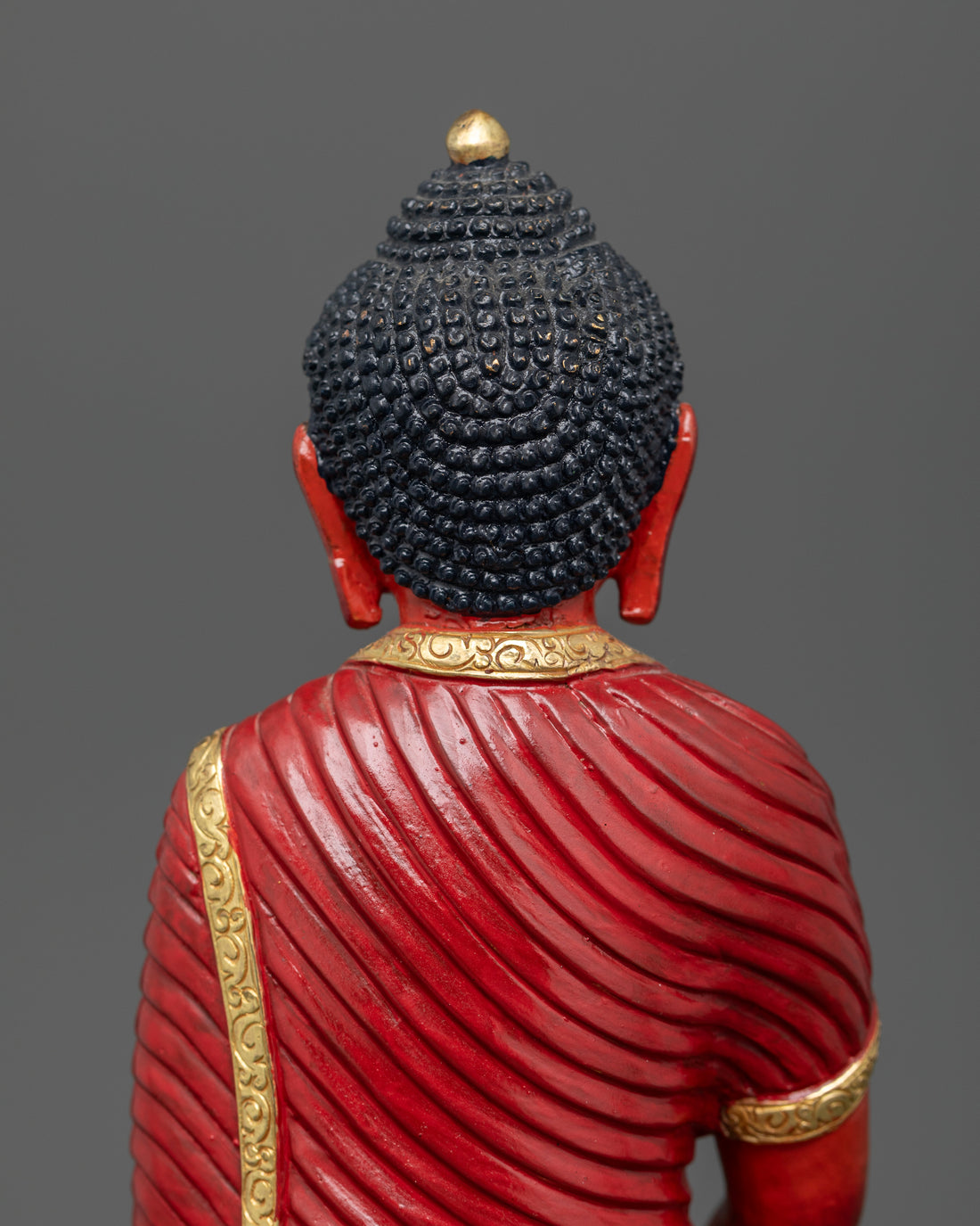 The Radiant Buddha: Symbolism of Amitabha in Red