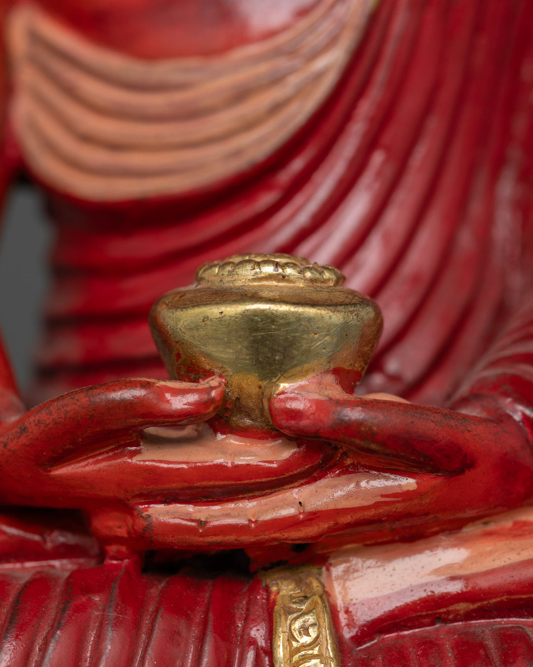 The Radiant Buddha: Symbolism of Amitabha in Red