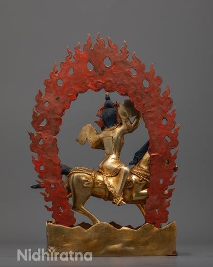 Back view of Achi Chokyi Drolma statue highlighting intricate carving on shifting landscape base