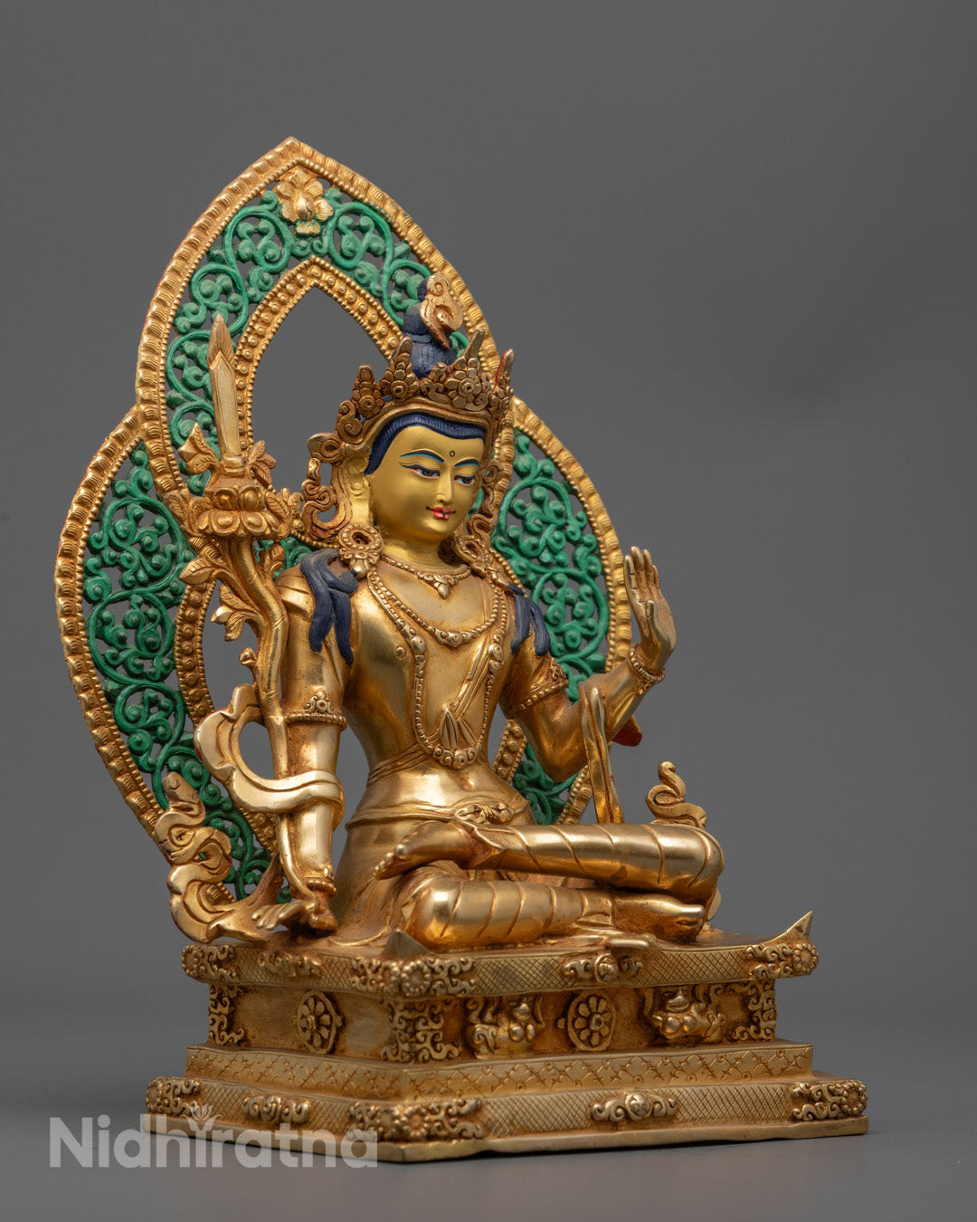 Akasagarbha Bodhisattva holding a wisdom sword entwined with uptala flowers, embodying the power to cut through ignorance and delusion.

