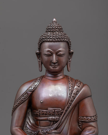 Amida Buddha face close-up - serene expression, lost-wax copper craftsmanship.