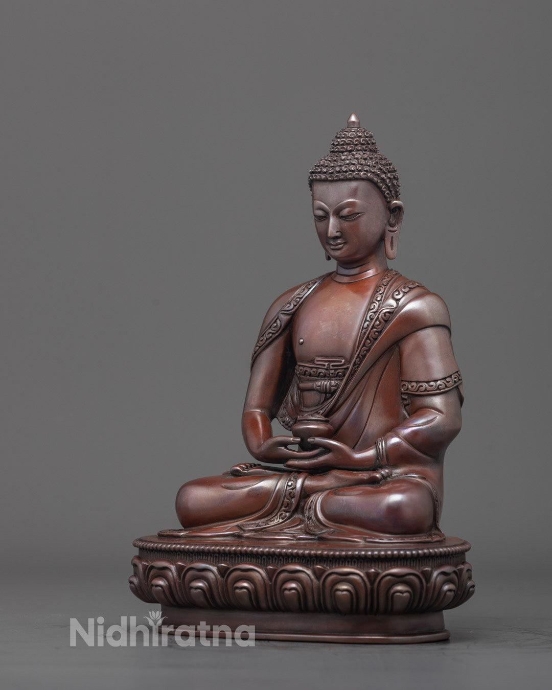 Amida Buddha side profile - seated posture, moon disc, intricate detailing.