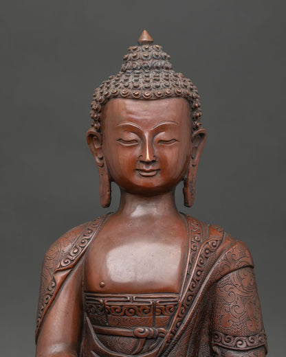 Amitabha Buddha close up serene face detailed hand carved monk robe copper statue from Patan Nepal spiritual meditation and awakening symbolism.