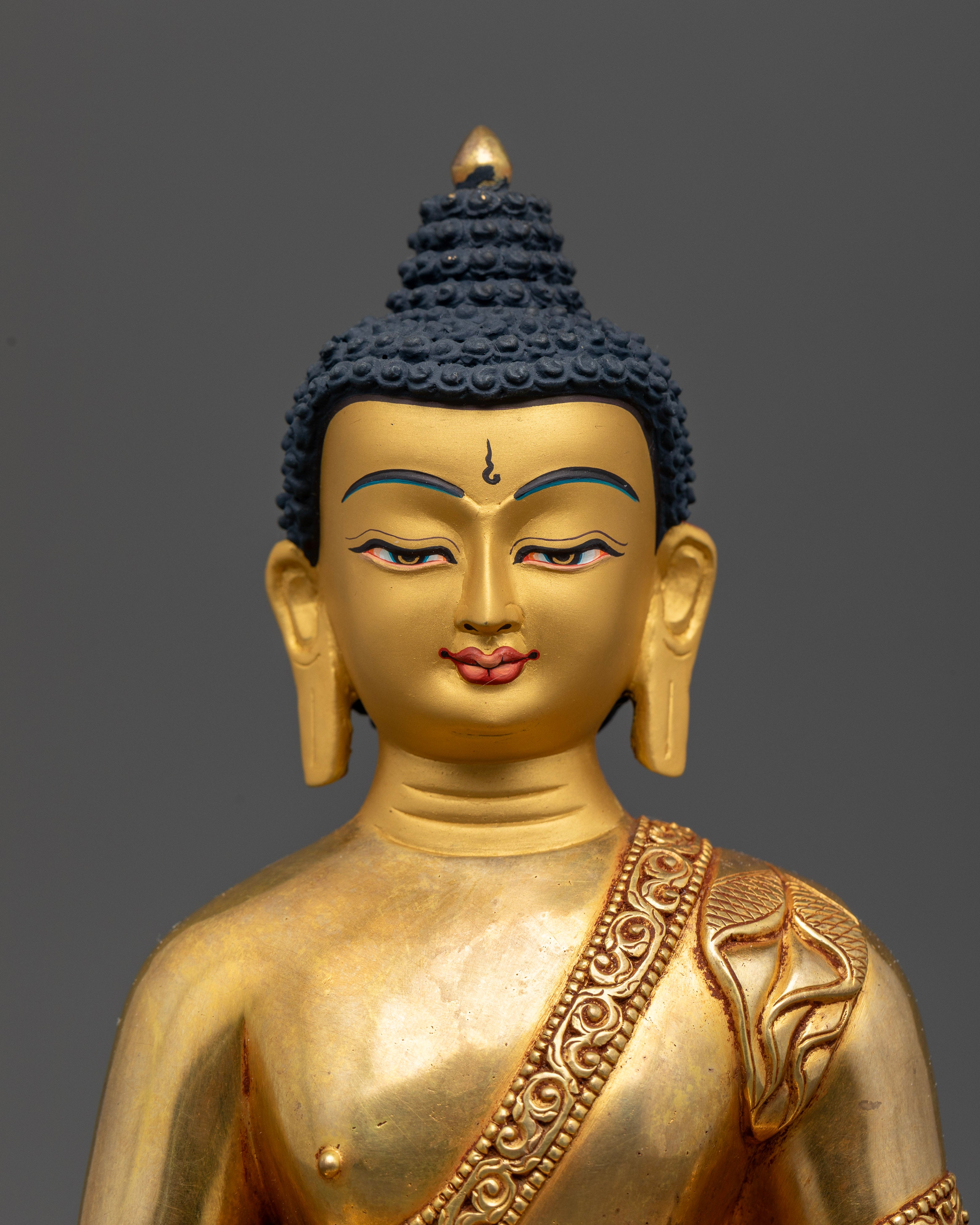 Amitabha Buddha gold painted face holding monk alms bowl.