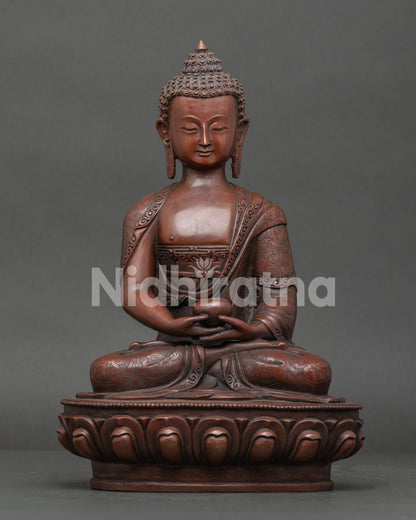 Amitabha Buddha holding alms bowl symbol of generosity and renunciation oxidized copper finish Himalayan Buddhist craftsmanship.