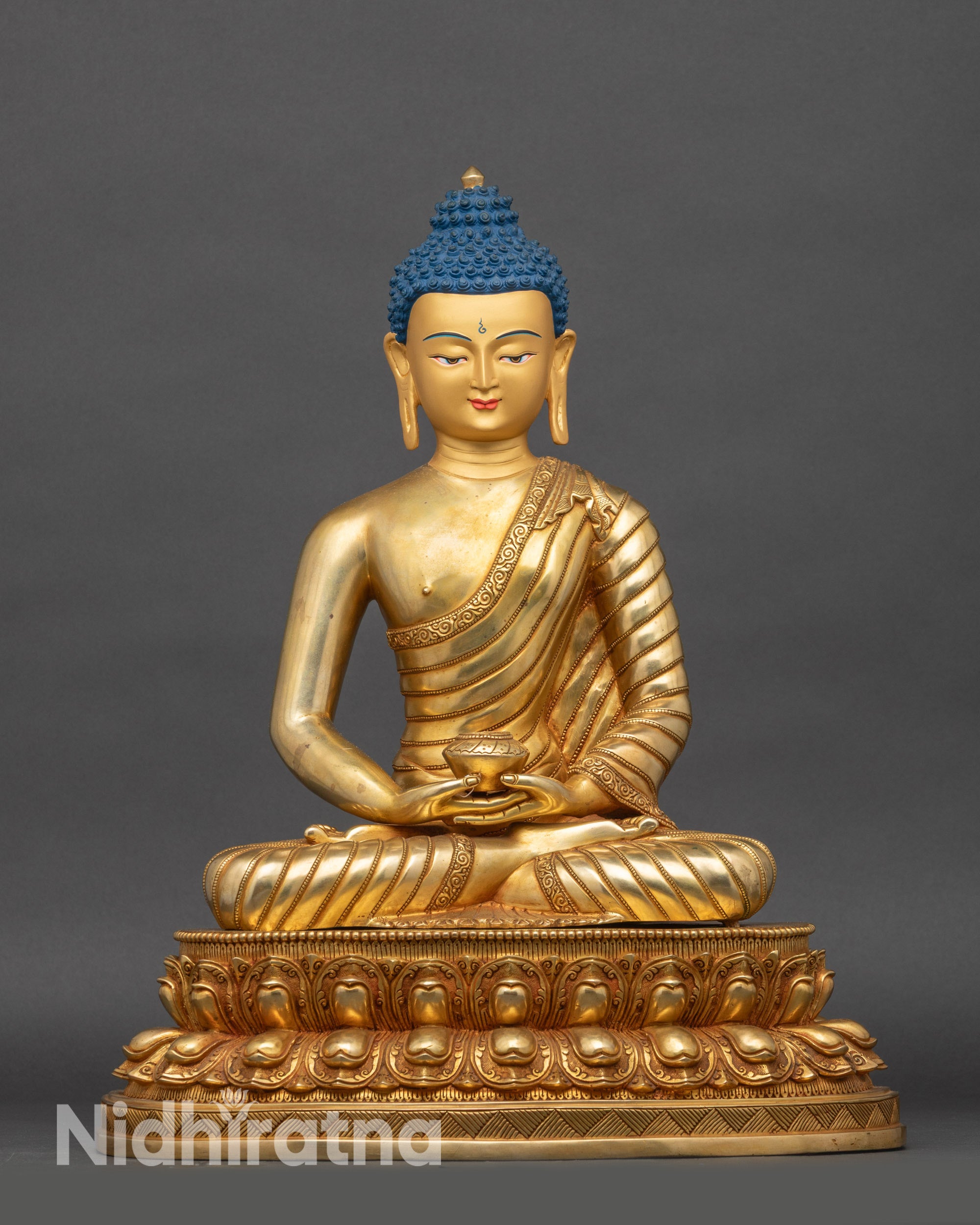 Front view of Amitabha Buddha statue, gold fire-gilded copper, seated on lotus throne