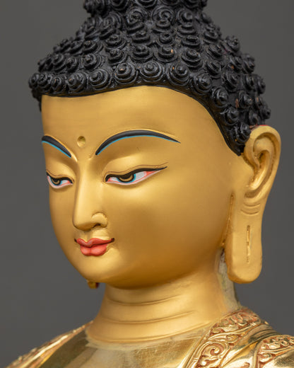 Amitabha Buddha face side close up with gold fire-gilding details