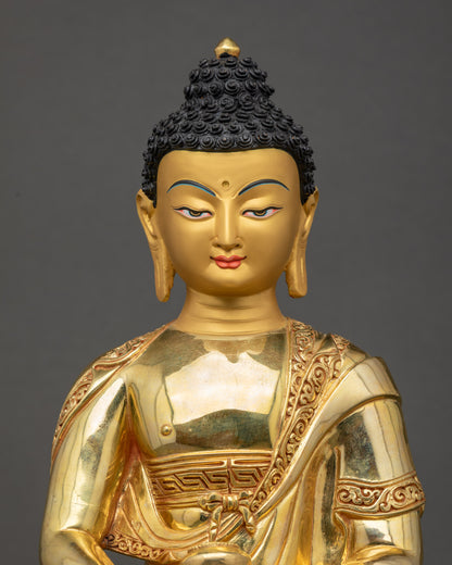 Amitabha Buddha statue close up showing intricate 3D carvings and gold details