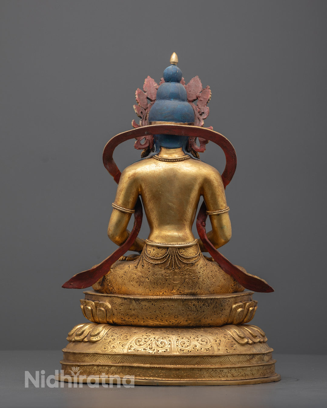 Back view of Amitayus statue showing robe carvings and throne craftsmanship