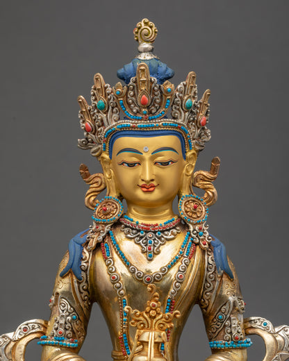 Amitayus Buddha Statue close up gold-gilded Nepalese meditation sculpture