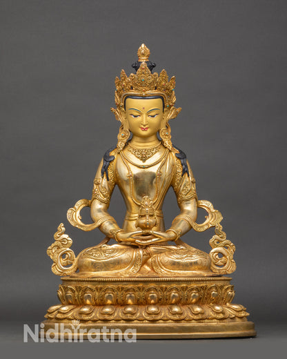 Front view of Amitayus Buddha statue, gold fire-gilded copper, holding long-life vase
