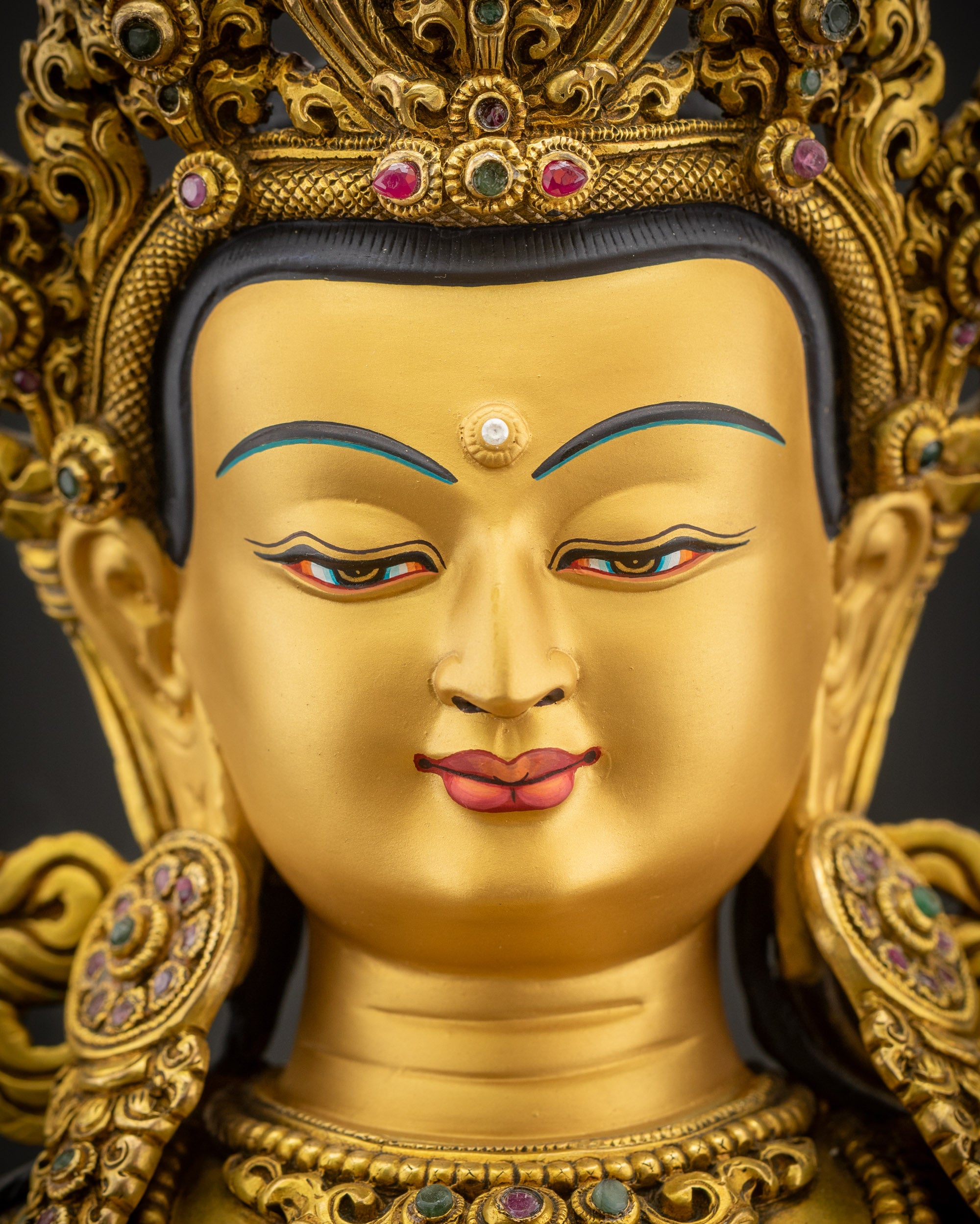 Detailed close-up of Amitayus Statue face showcasing peaceful expression, radiant halo, and intricate ornaments