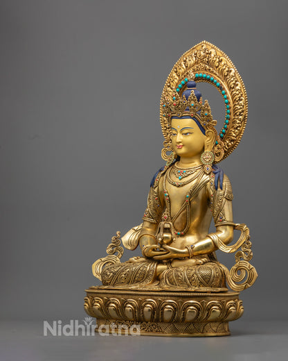  Amitayus statue showcasing the flowing robes, sacred amrita vase, and elaborate swirling patterns around the lotus seat.